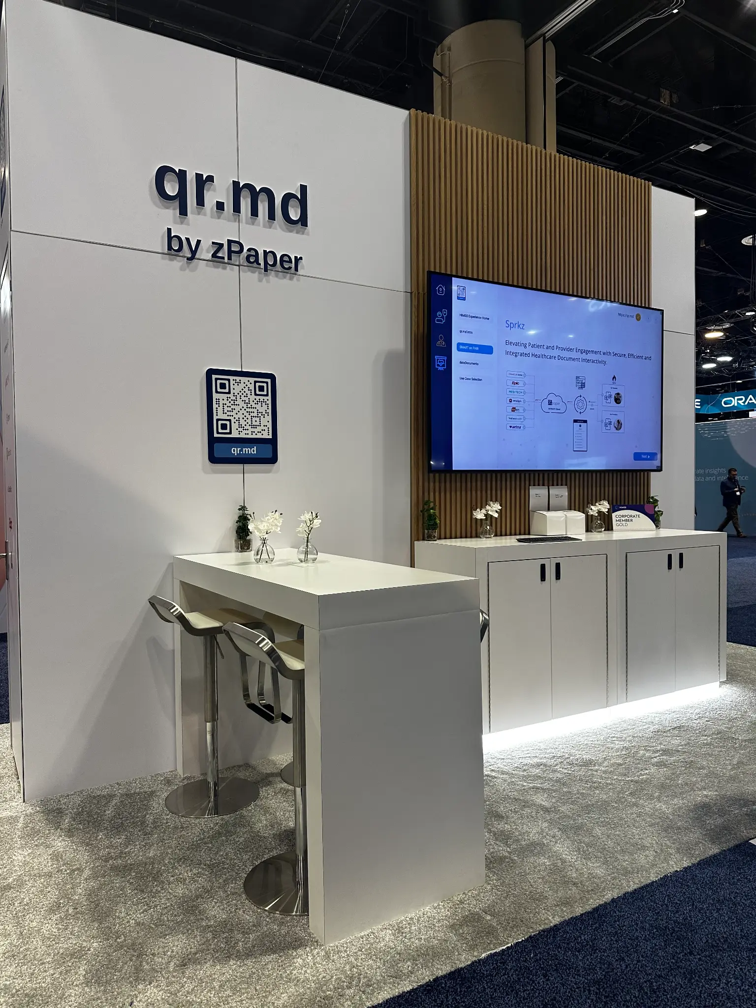 qr.md by zPaper trade show booth with QR activation and product screen